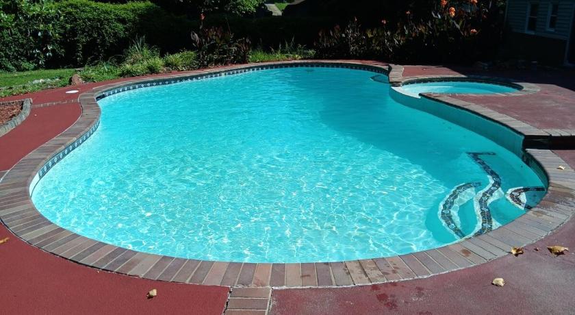 Theater, heated pool and hot tub near HPU and Furniture Market