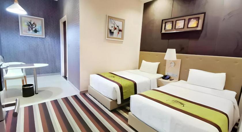 รูปของดีลักซ์ เตียงแฝด (Deluxe Twin Room) 0