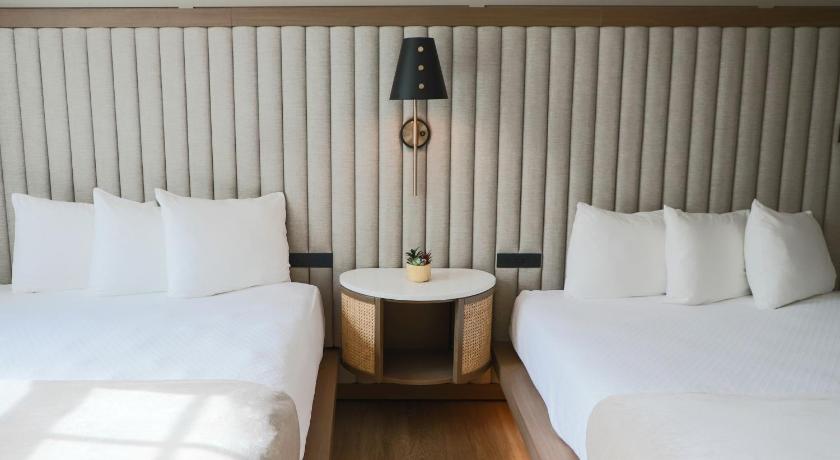 Image of Superior Room Corner Balcony with 2 Queen Beds City View 6