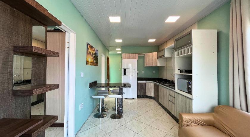 Foto Casa completa no 2º andar •Wi-Fi• garagem coberta - Booking Diskon Spesial