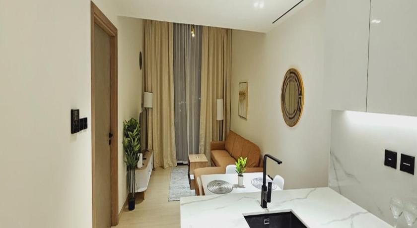 Luxurious Belvilla 1BR JVC with Pool Gym & BBQ Access - image 6