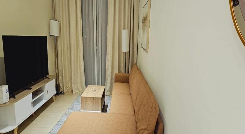 Luxurious Belvilla 1BR JVC with Pool Gym & BBQ Access - image 14