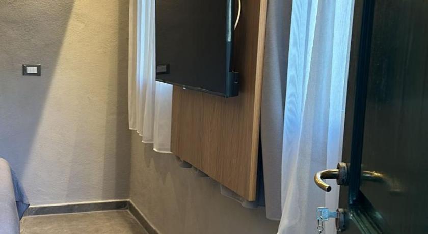 Фото: Двухместный номер с 1 кроватью или 2 отдельными кроватями (Double or Twin Room) 5