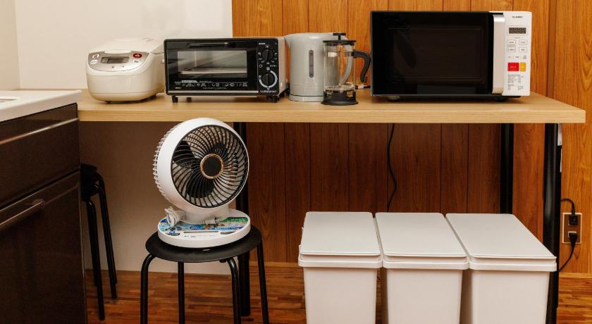 冲绳岛 炭でBBQ可能Grandmas House 山の宿はジャングリアすぐ近く 4星级 单人房 餐厅