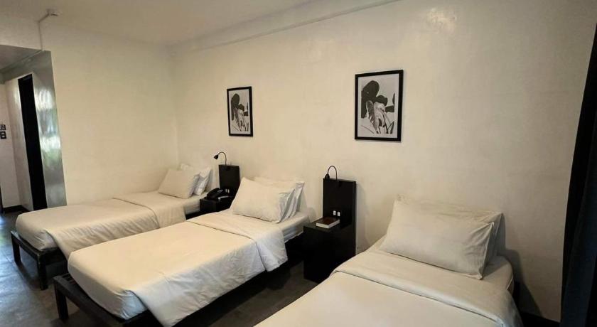 Image of Triple Room with Private Bathroom 7
