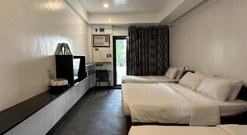Image of Triple Room with Private Bathroom 1