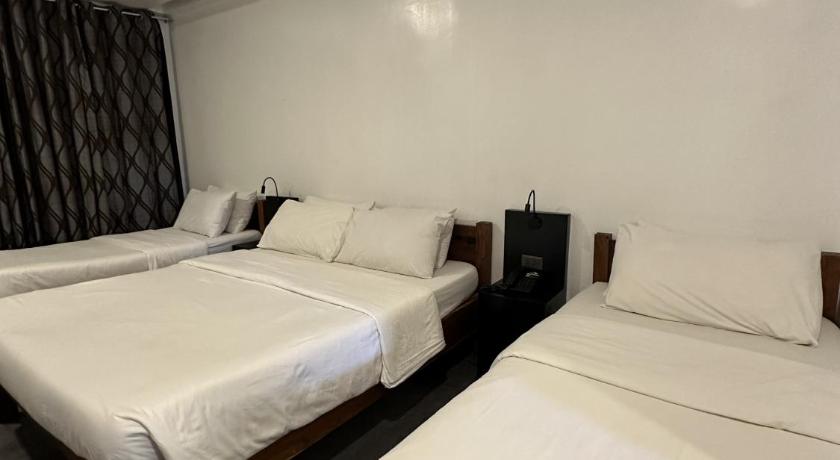 Image of Triple Room with Private Bathroom 8