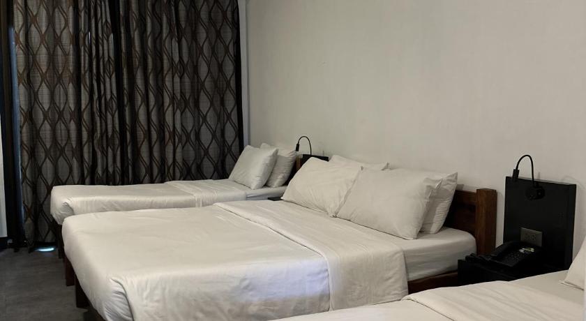 Image of Triple Room with Private Bathroom 6