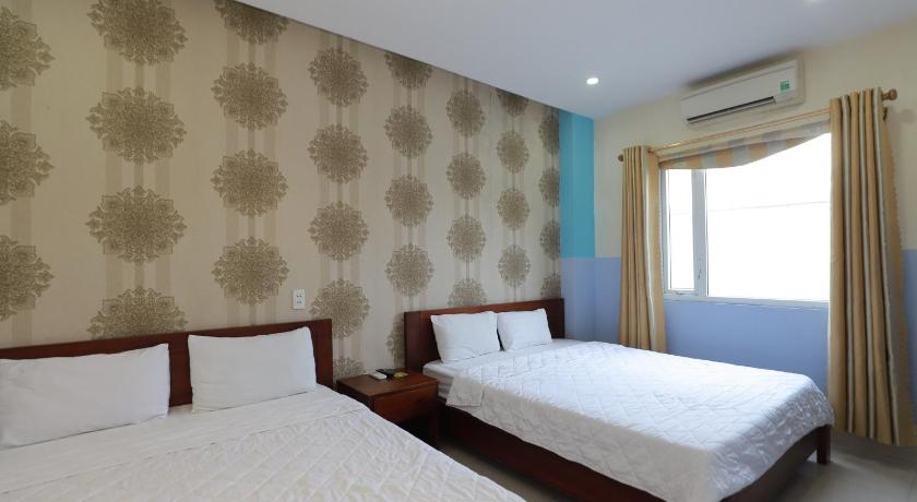 Image of Triple Room with City View 1