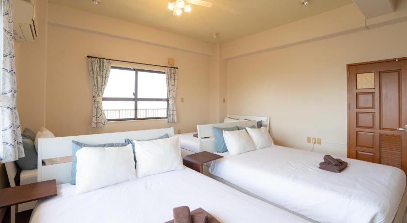 오키나와 본섬 島テラス高台から太平洋を眺める最高のロケーションハウス 3성급 싱글룸 수영장