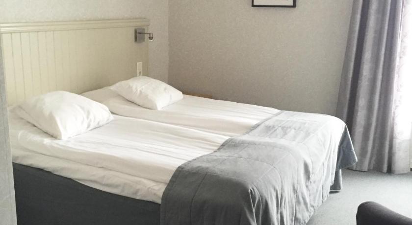 Soba z zakonsko ali enojnima posteljama Adels Hotel
