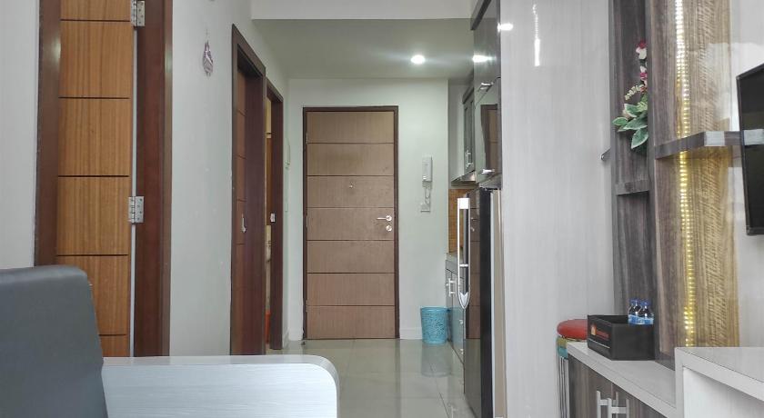 마카사르 Best Deal and Cozy 2BR Vida View Apartment By Travelio 3성급 싱글룸 레스토랑