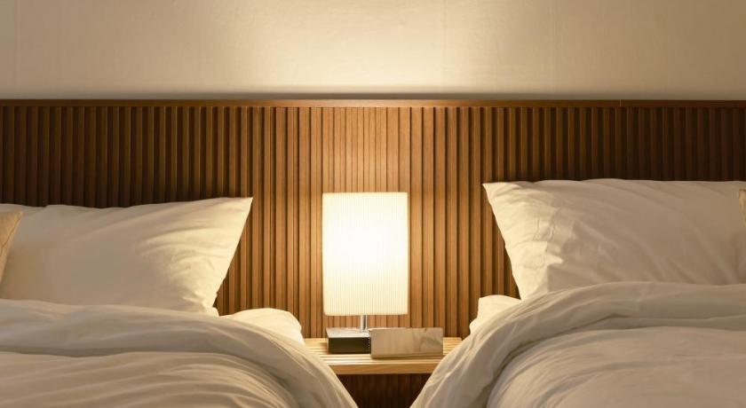 Seoul Walking Distance to Sindorim Station, 3 Rooms, 4 Queen Beds, 2 Bathrooms, 1 Minute to Yeongdeungpo S 4-Star Accommodation room