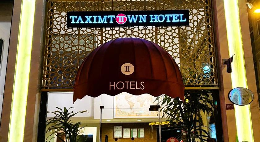 Taximtown Hotel - image 10