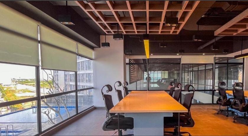 마카사르 Delft Apartemen CPI 4성급 싱글룸 레스토랑