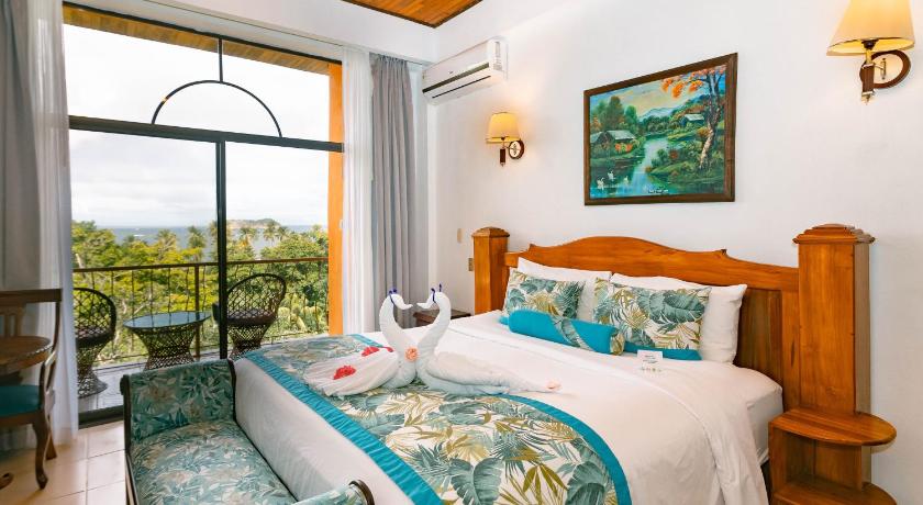 Image of Deluxe Room with Partial Ocean View 0