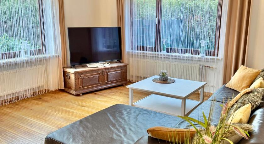 Ferienwohnung im Erdgeschoss mit eingezaunten Garten und Terrasse