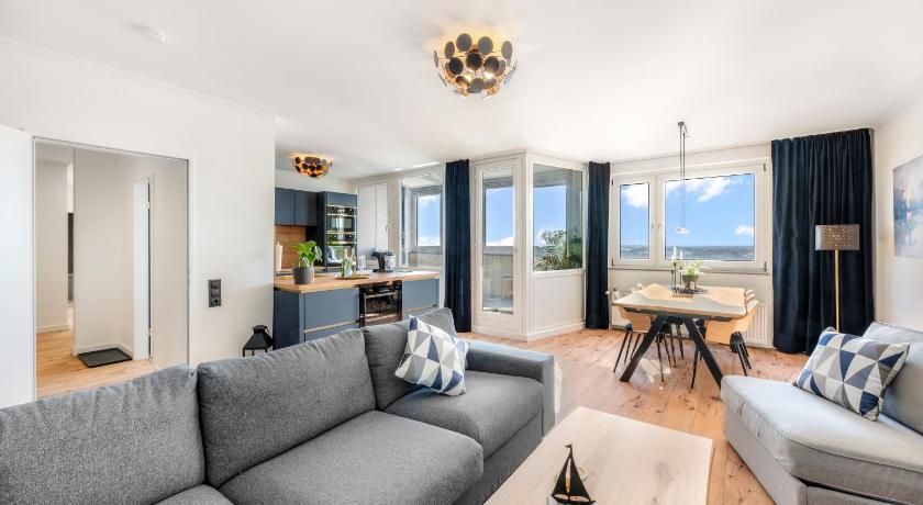 Exklusives Apartment Sunrise mit Whirlpool im 24-OG, Zugang zu Pool und Sauna