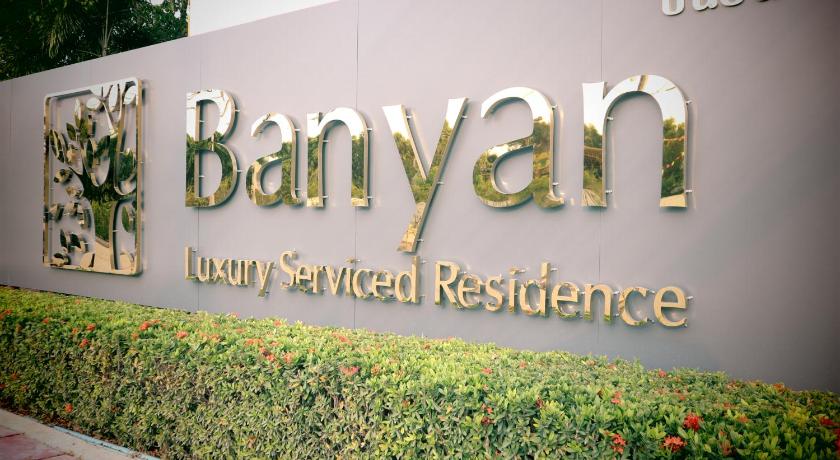 a sign on the side of a building, Banyan Residence in Rayong