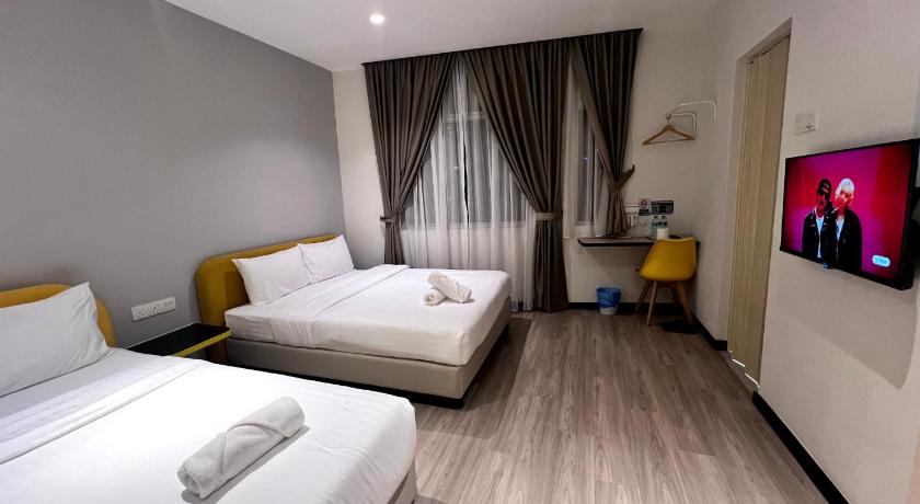 Image of Triple Room - 1 Double Bed and 1 Single Bed 0
