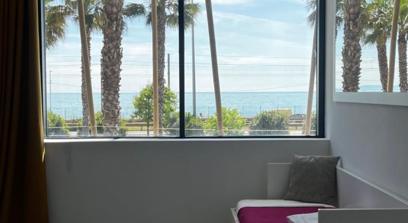 Image of Triple Room with Sea View 0