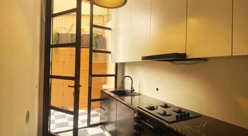 Három hálószobás ház (Three-Bedroom Townhouse) fotója 1