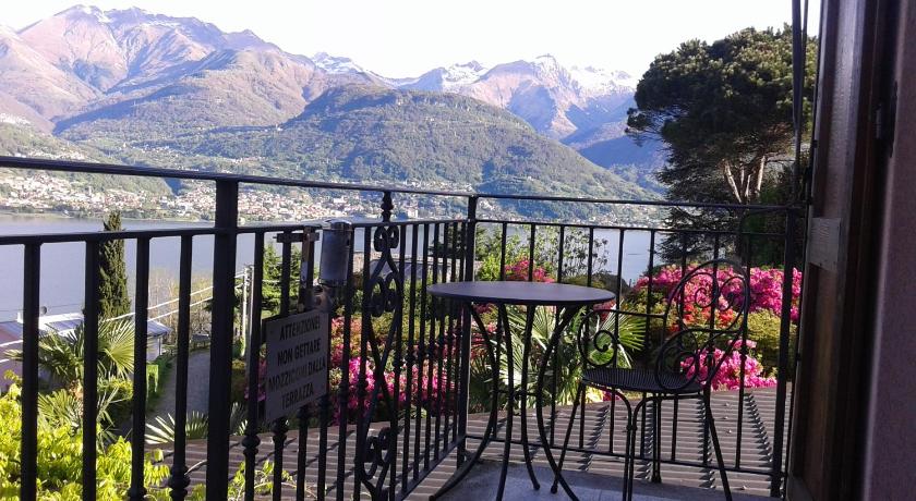 a view from a balcony of a mountain range, Albergo Ristorante Conca Azzurra in Colico