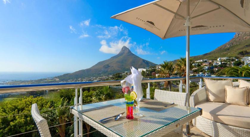 Image of Deluxe Junior Suite with Terrace, Sea View and Mountain View (Master Bedroom) 1
