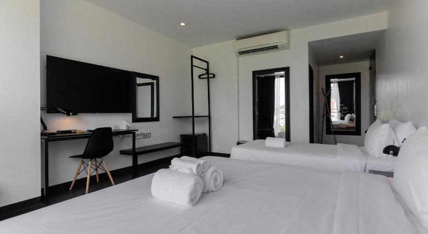 Image of Standard Triple (1 Double Bed And 1 Single Bed) 6