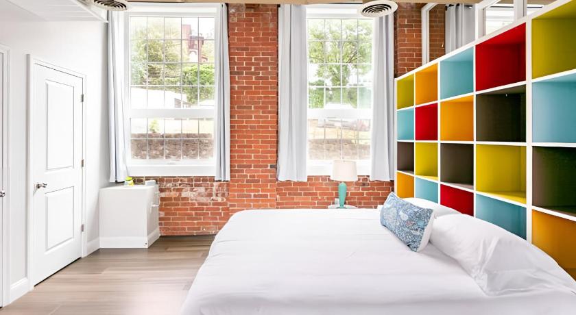 Jennifer's Historic Loft Glass Bedroom