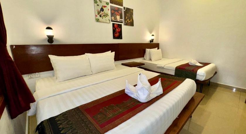 Image of Deluxe Triple Room 5