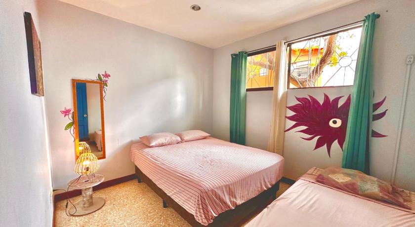 Image of Basic Triple Room with Shared Bathroom 4