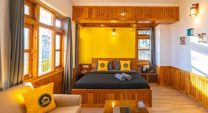 Image of Deluxe Quadruple Room with Balcony and Mountain View 0