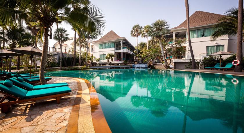 a pool with a pool table and chairs in it, Bannpantai Resort (SHA Extra Plus) in Hua Hin / Cha-am