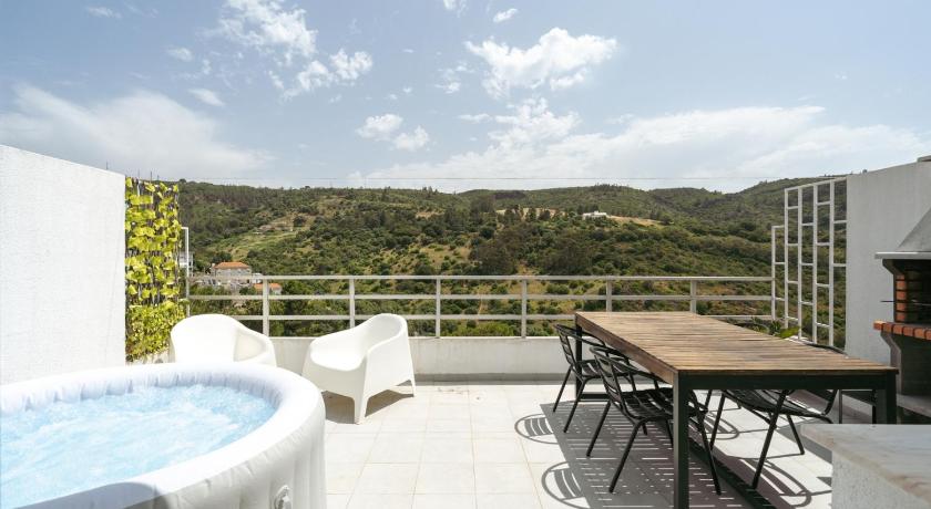 Sunny Flat w/ Jacuzzi & Balconies by Host Wise