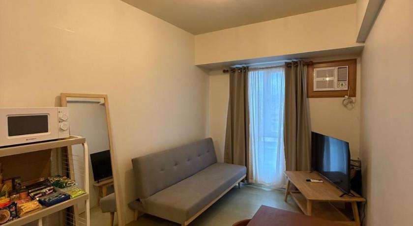 Lily’s Haven - 1 Bedroom Cornered Condo Unit - image 2