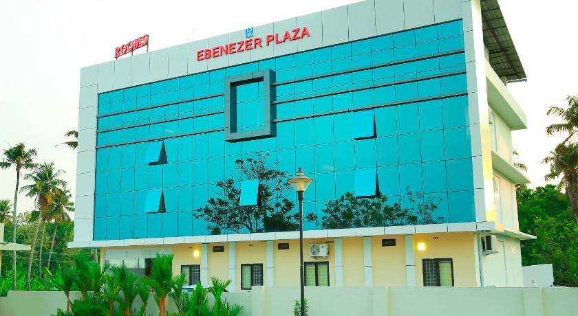 a large building with a sign on the side of it, Ebenezer Plaza in Kochi