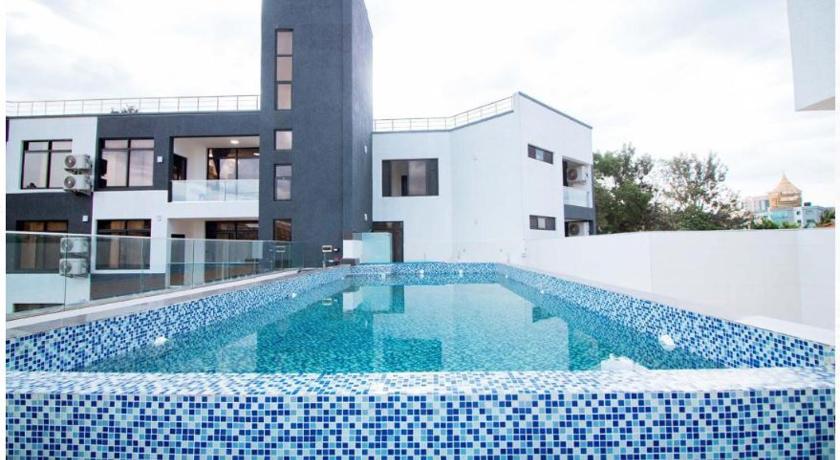 キガリ Cascadia Hotel Apartments by GF Greenland 4つ星 ホテル レストラン