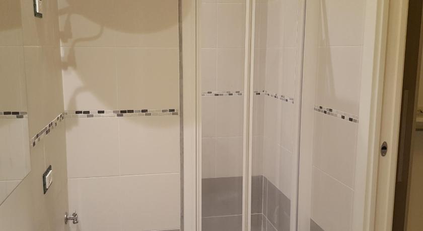 a bathroom with a shower, sink, and mirror, Ca Da Franchina in Riomaggiore