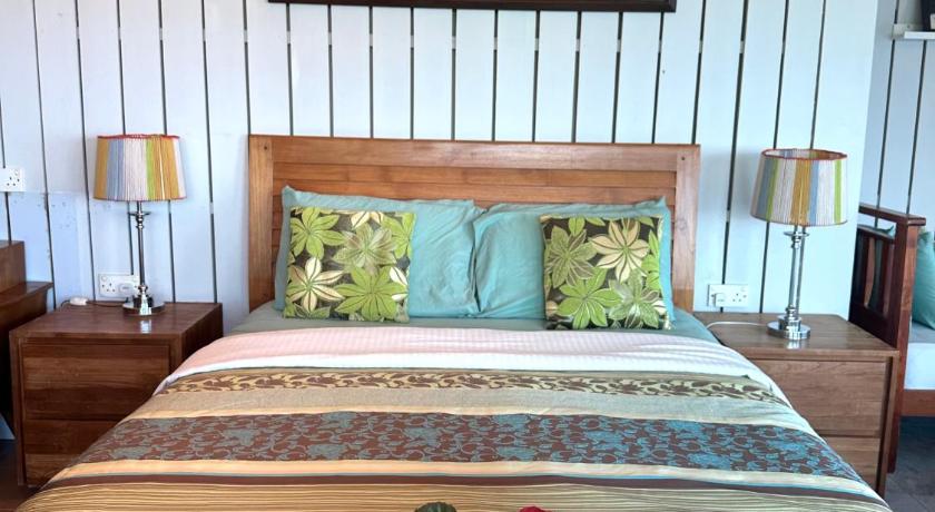 Image of Quadruple Room with Sea View 16