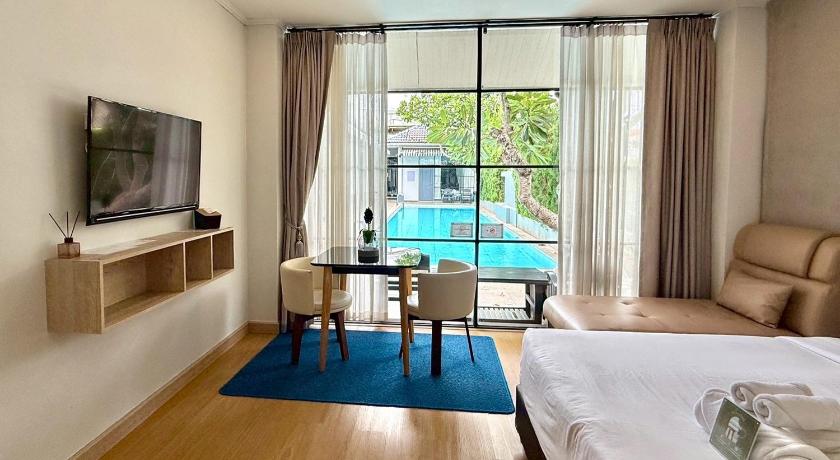 รูปของห้องจูเนียร์สวีทใกล้สระว่ายน้ำ (Junior Suite with Pool Access) 4
