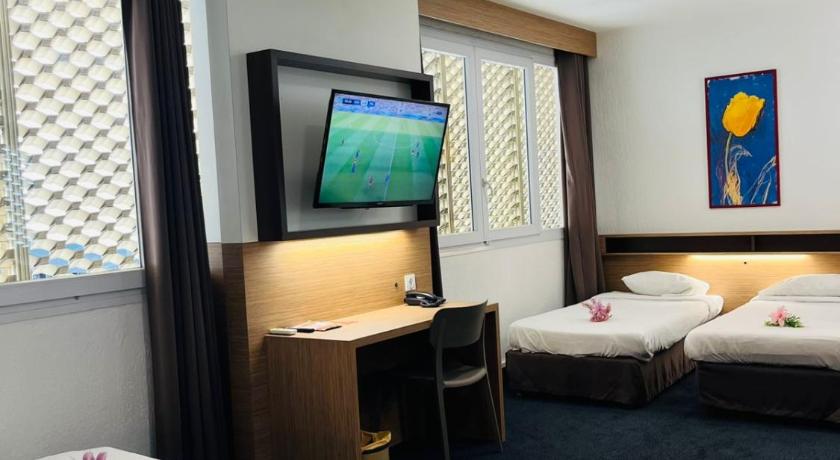 รูปของห้องดีลักซ์สำหรับสี่ท่าน (Deluxe Quadruple Room) 15