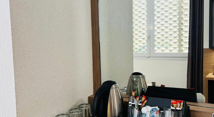 รูปของห้องดีลักซ์สำหรับสี่ท่าน (Deluxe Quadruple Room) 12
