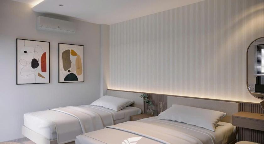 Image of Twin Room with Private Bathroom 1