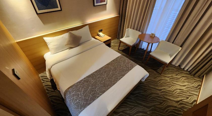 Image of Standard Double Room - Side Building View 9