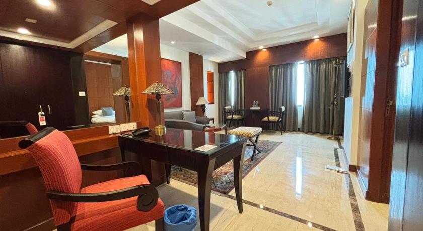 Image of Executive Suite Room -  Happy Hours – Buy 1 Get 1 on Alcoholic Beverages • 15% Off on À-la-carte Food & Beverage Services • 10% Off on Laundry Services 0