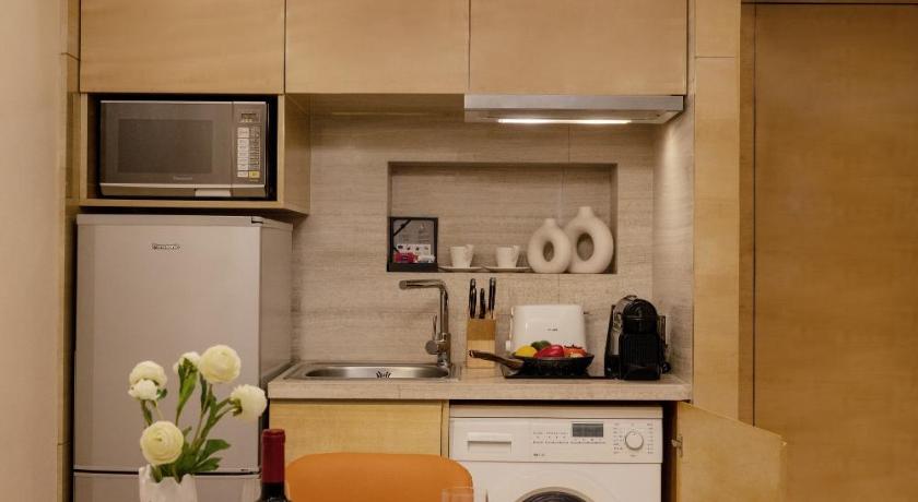 Image of One Bedroom Suite Living Dining Kitchenette 6