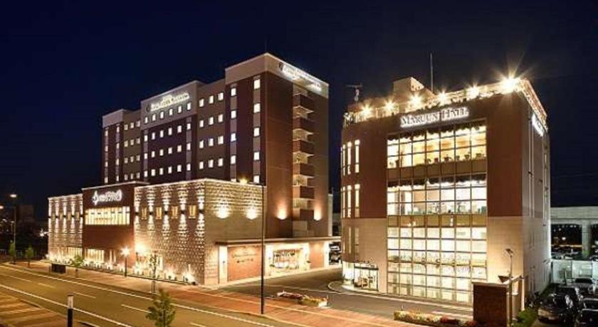 a large building with a lot of windows on the side of it, Hotel WBF Grande Asahikawa in Asahikawa