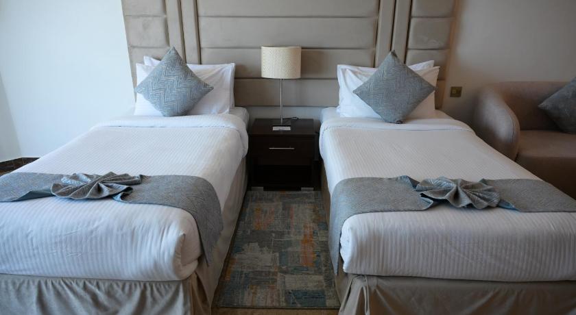 Image of 2 Single Beds, Superior Room, Sofa 7