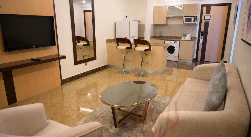 Image of Apartment - 1 King Bed, Smoking Room, One Bedroom, Kitchenette, Sofa, Microwave And Refrigerator, Wi 11